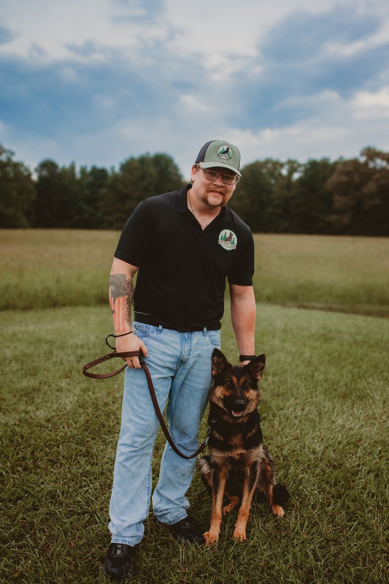 Alexander with a German Shepherd